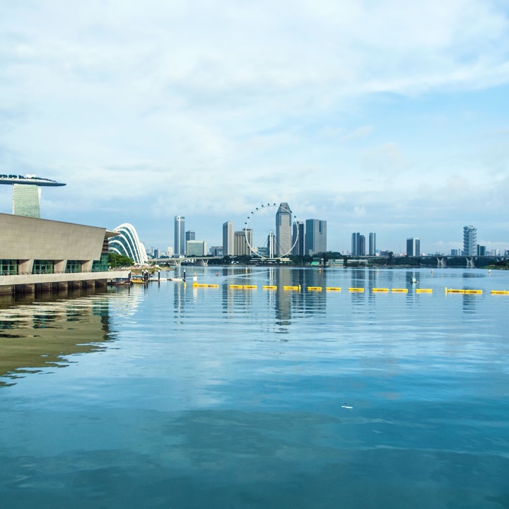Singapore waterfront and skyline across Marina Bay in daylight
